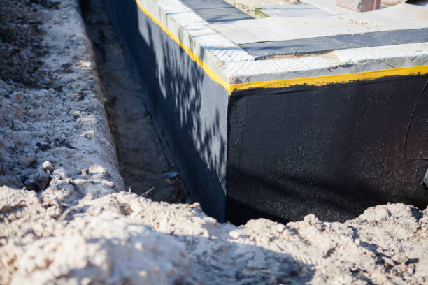 Professional Waterproofing technician working in Metuchen, NJ